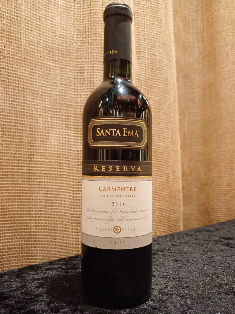 The Santa Ema Carmenère Reserva 2014 undergoes a meticulous production and aging process that reflects the dedication and expertise of its winemakers