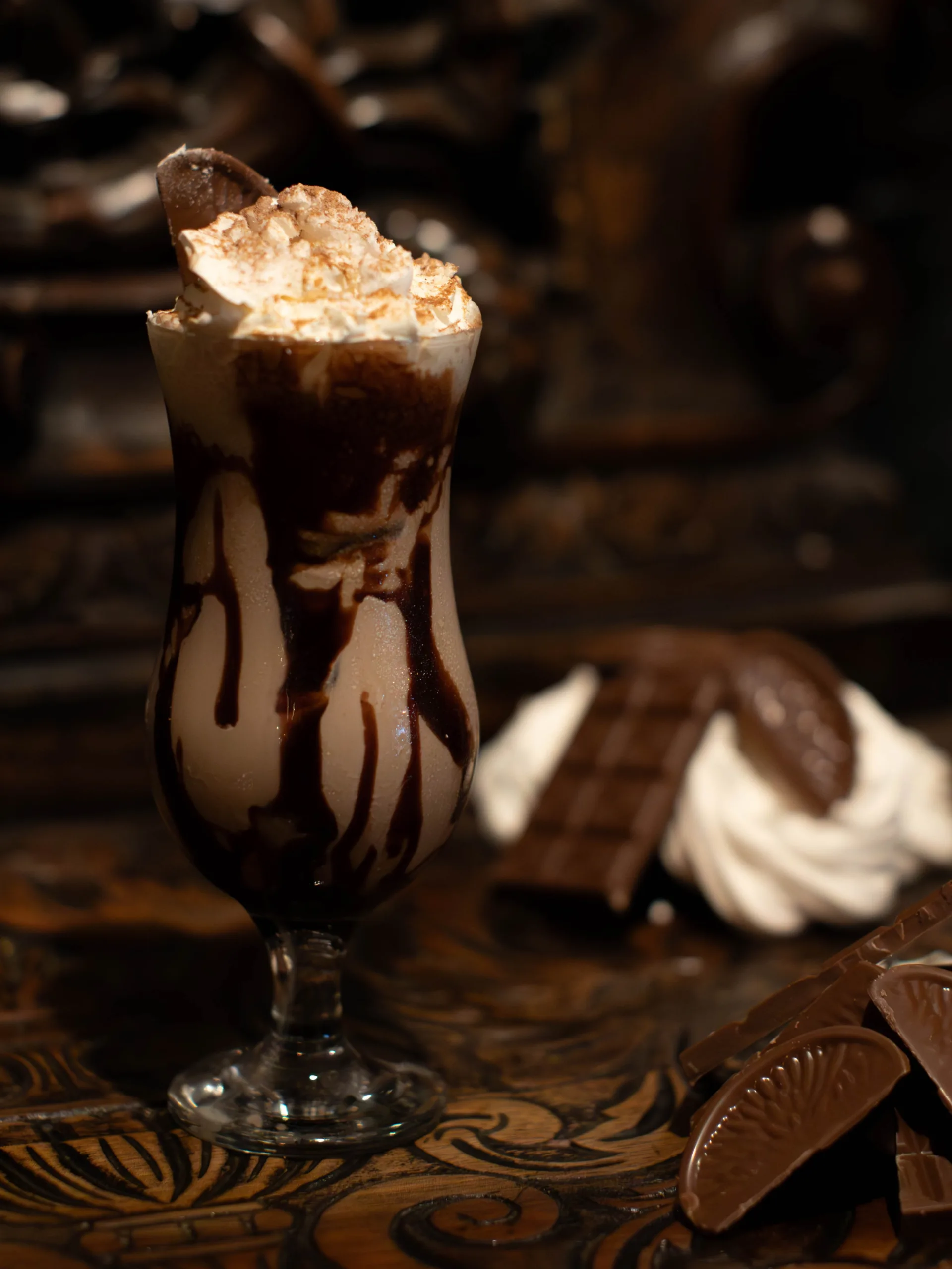 Gluttony Halloween Cocktail: This rich and creamy cocktail combines the smoothness of chocolate ice cream with the warmth of white rum, Baileys, and Kahlua. Sugar syrup adds an extra touch of sweetness, making it irresistibly luscious.