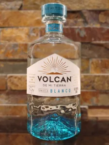 Volcan De Mi Tierra Blanco Tequila back label Offers a truly captivating tasting experience that sets it apart from other Blanco tequilas. From the moment you pour it into your glass, the clear, crystalline liquid hints at the purity and quality of the spirit
