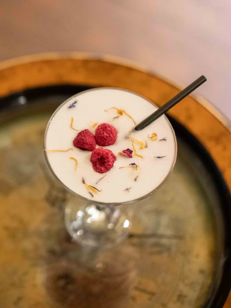 French Martini, As it settles in the glass, the initial aroma is a bright, sweet greeting of ripe pineapple, quickly followed by a subtle, creamy undertone from the Coconut Bacardi