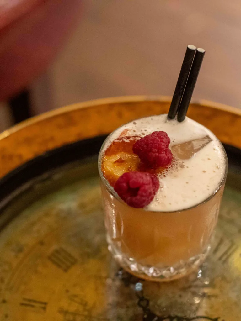 The Peach Moscow Mule Cocktail is a vibrant symphony of sweet, tart, and spicy notes, a playful twist on the classic.