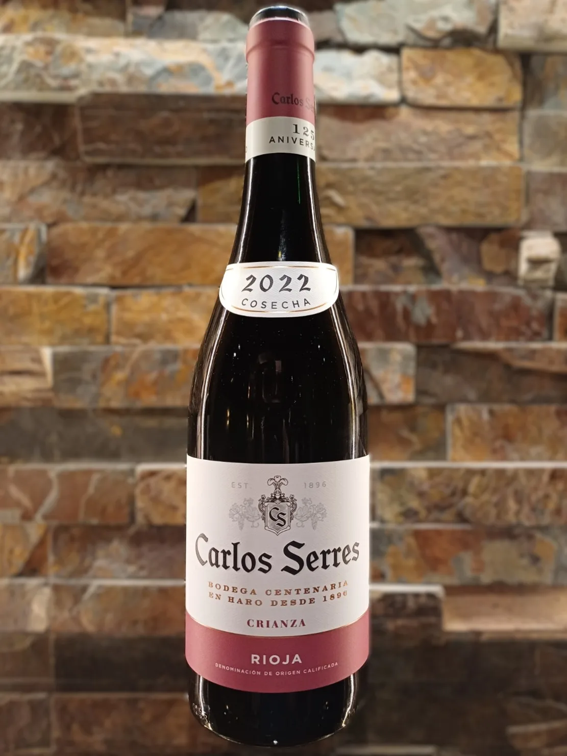 Carlos Serres Rioja Crianza offers a smooth and classic taste of ripe red cherry and raspberry, elegantly layered with notes of sweet vanilla spice from its oak aging.