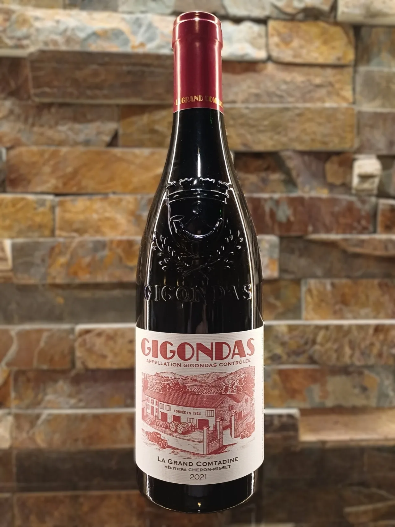 Gigondas La Grand Comtadine 2021 Elegant Gigondas balances concentrated dark cherry and raspberry fruit with savory notes of Provençal herbs and black pepper, all framed by silky tannins and a distinctively fresh finish.