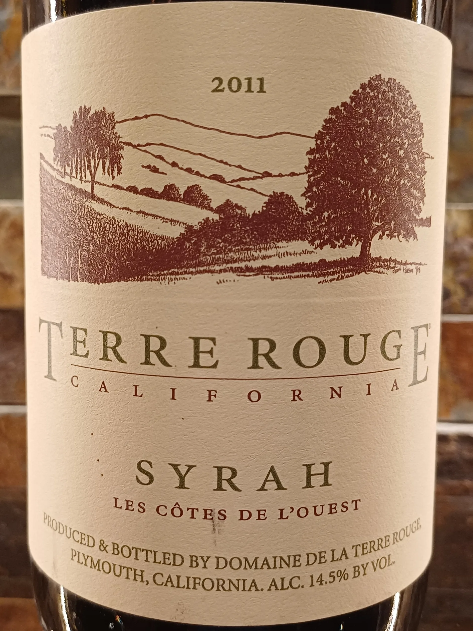 Terre Rouge Cotes de L'ouest Syrah 2011 - fully mature Syrah that prioritizes savory notes of white pepper, cured meat, and tart blackberry over fruit weight, offering a rustic,
