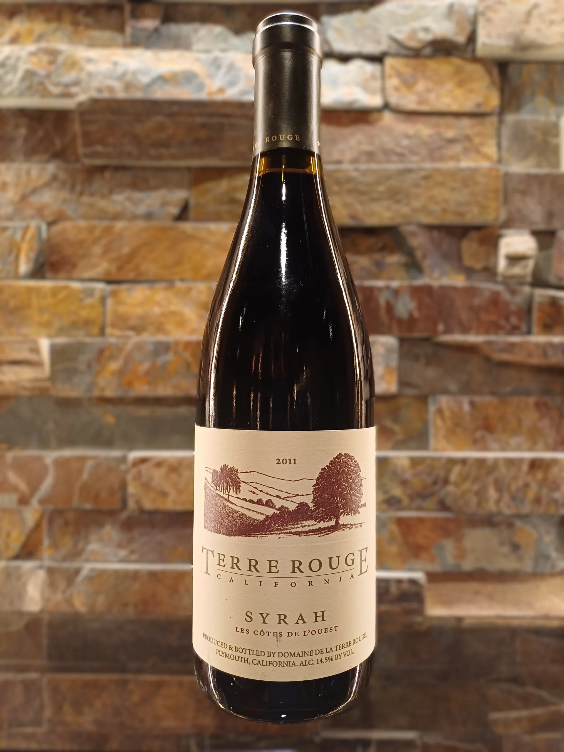 Terre Rouge Cotes de L'ouest Syrah 2011 - fully mature Syrah that prioritizes savory notes of white pepper, cured meat, and tart blackberry over fruit weight, offering a rustic,