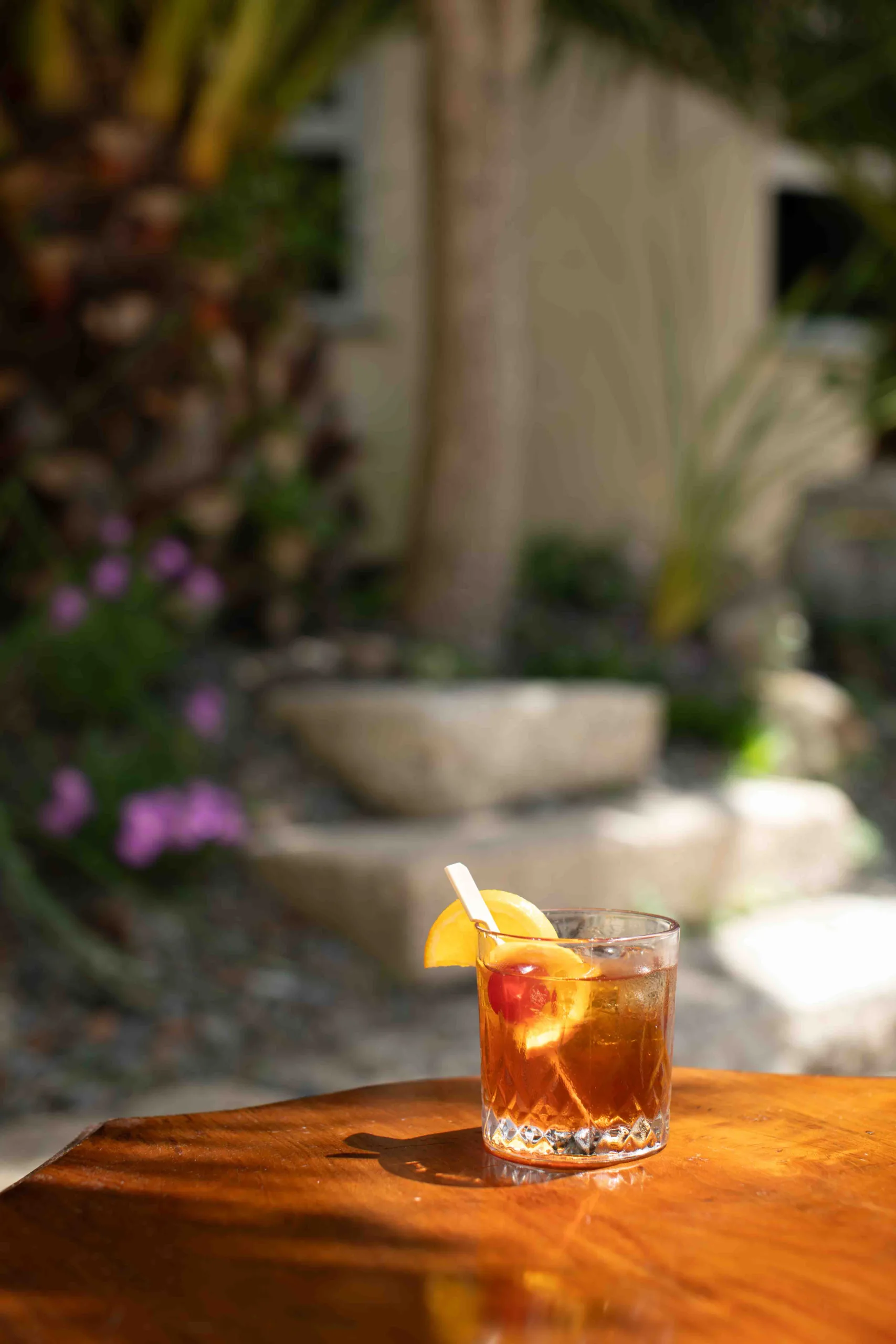 The Rum Sour is a warmly spiced, citrus-forward classic — sweet spiced rum balanced by sharp lemon and lime, smoothed with syrup and finished with a fragrant orange and cherry garnish.