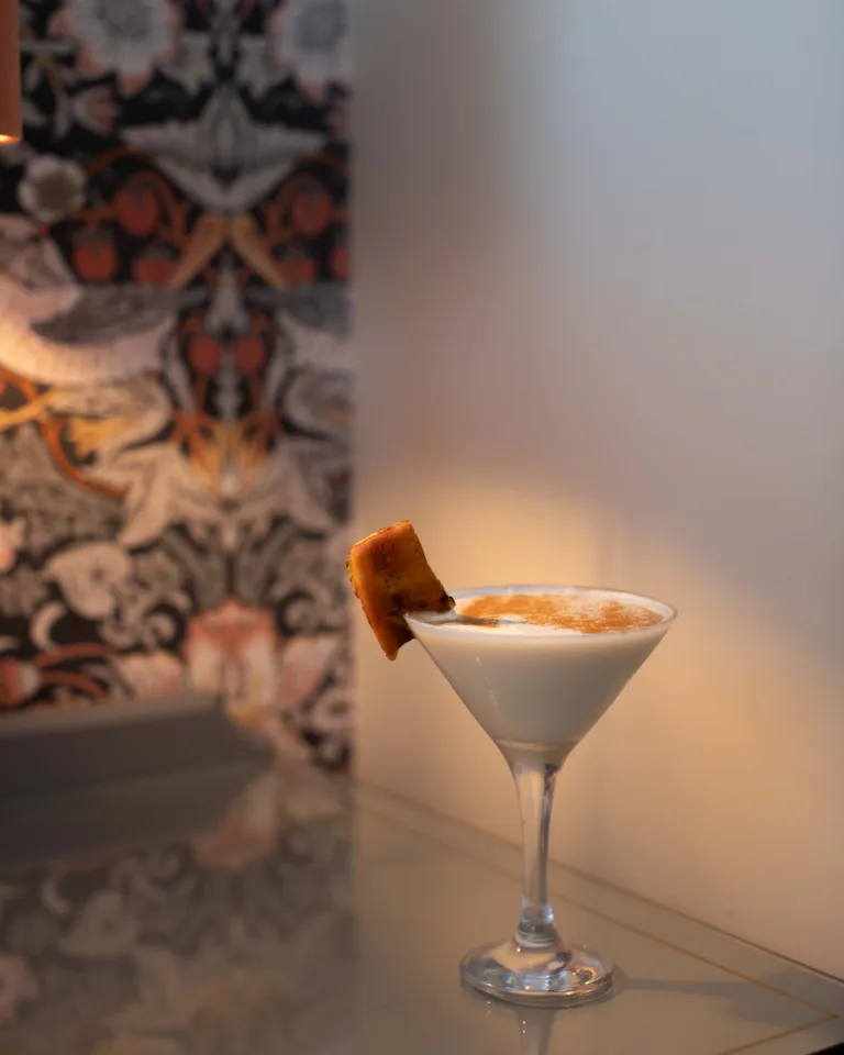 Salted Banoffee Daiquiri Cocktail - A dessert-style daiquiri built on banoffee pie flavours: ripe banana rum, smooth vanilla vodka, salted caramel and double cream, shaken cold and finishing rich, sweet and moreish.