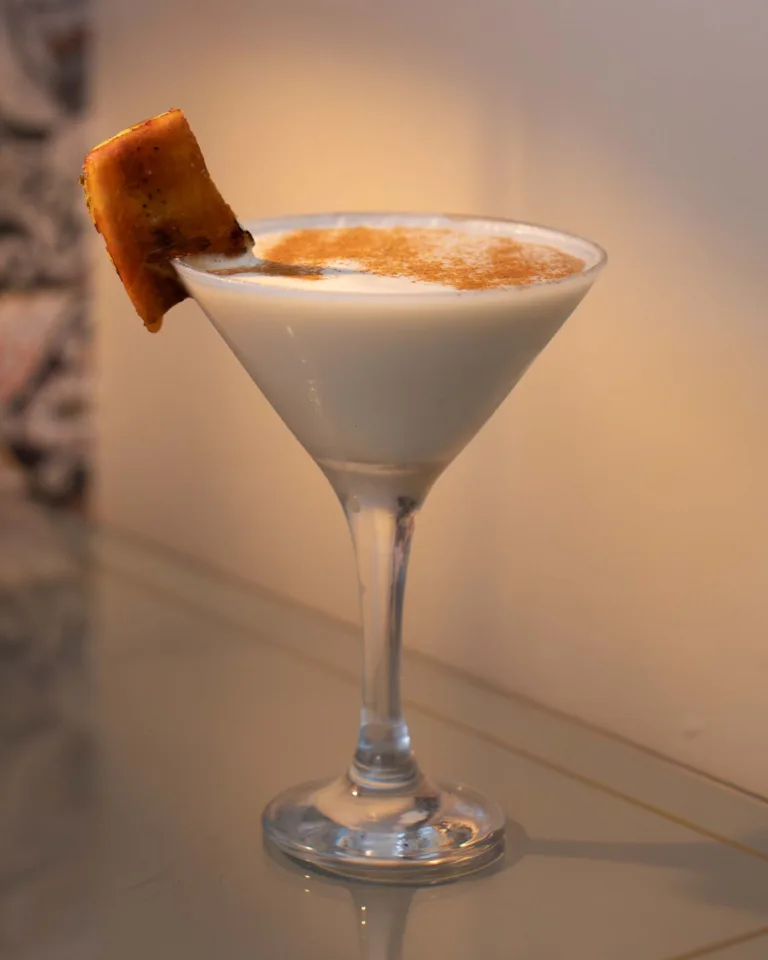 Salted Banoffee Daiquiri Cocktail - A dessert-style daiquiri built on banoffee pie flavours: ripe banana rum, smooth vanilla vodka, salted caramel and double cream, shaken cold and finishing rich, sweet and moreish.