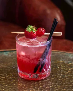 Cherry Daiquiri Cocktail lifted by dark cherry: sharp lime and sugar, ripe black cherry depth, and warm rum, hard-shaken and ice-cold, finishing short, clean and fruity.