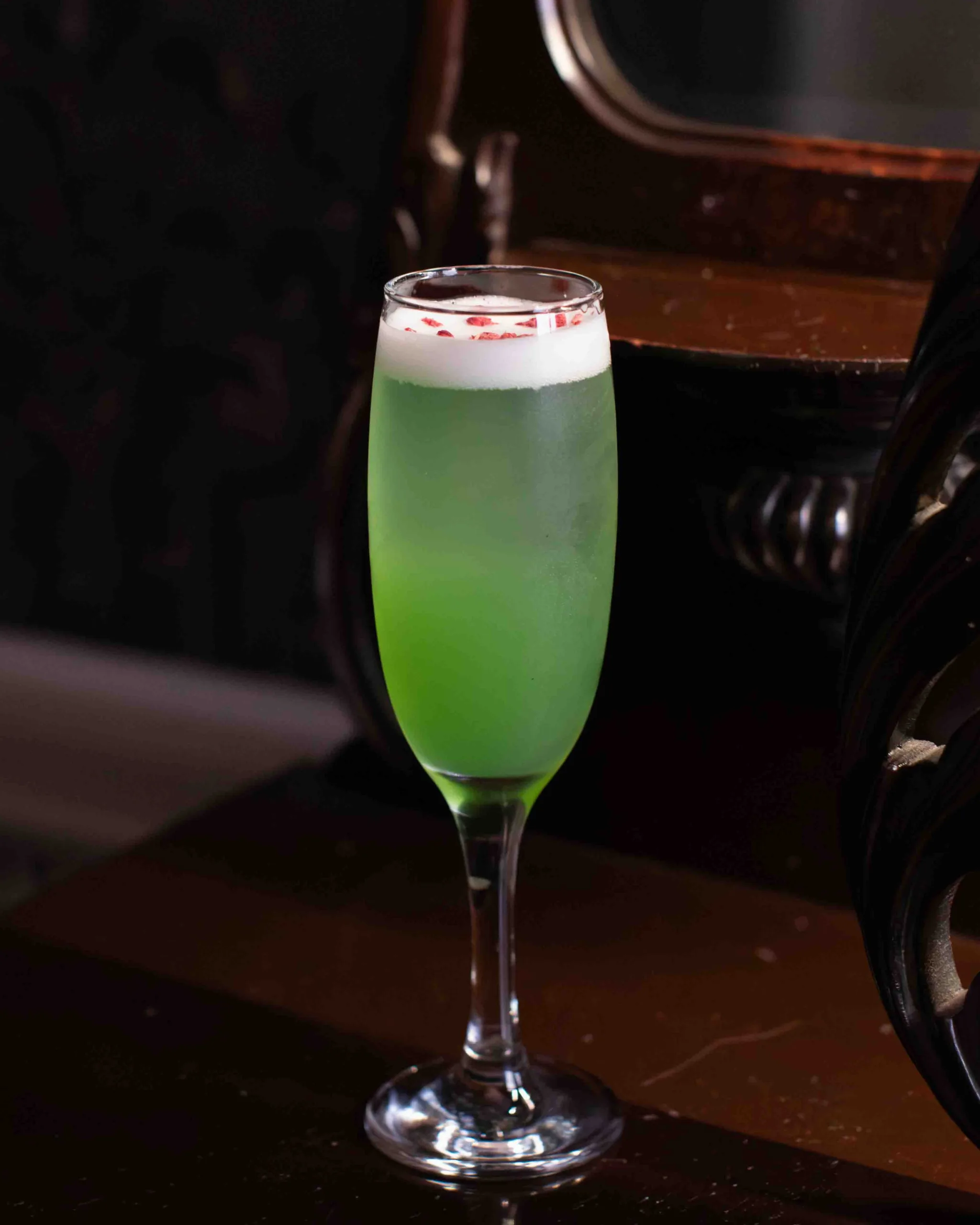 The Treat cocktail: vodka shaken with apple syrup, lemon and lime, topped with prosecco. Crisp orchard sweetness, zesty citrus and a lively sparkle make this a bright, refreshing, easy-drinking sipper.