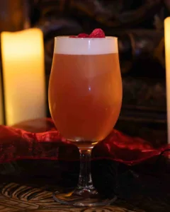 Twin Flame cocktail - A fruity vodka cocktail pairing raspberry vodka with floral lychee, tart cranberry and fresh lime, topped with silky foam: vivid pink, juicy and refreshing, with a bright, lightly perfumed finish.
